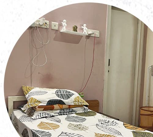 Made-up bed in a women's block room